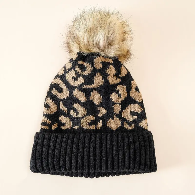 Damen Strickmütze mit Leopardenmuster und Kunstfell-Pompon