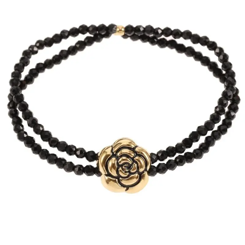 Goud met zwarte bloem bracelet