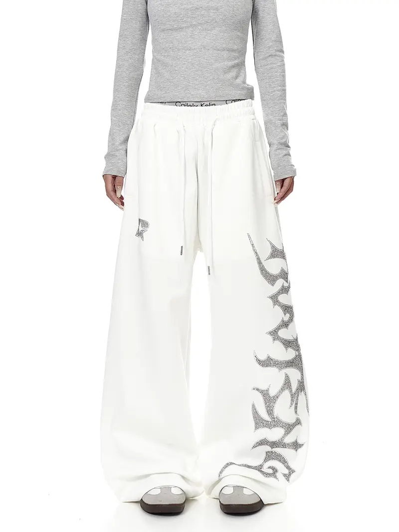 Sweatpants met wijde pijpen en strasssteentjes