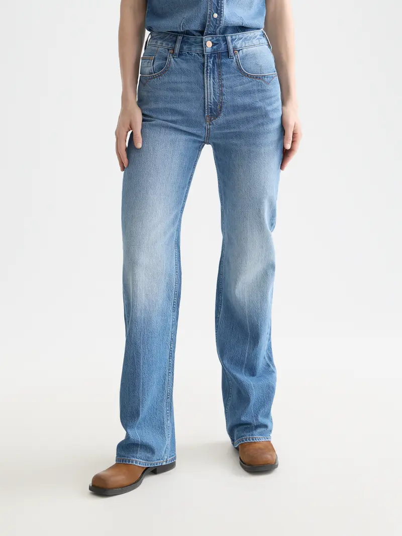 The Glow Bootcut Jeans